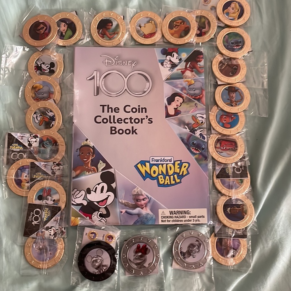 Complete set of Frankford Disney 100 coins including display book